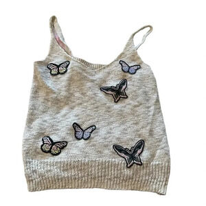 Divided women's size large tan knit sleeveless top with butterfly patches